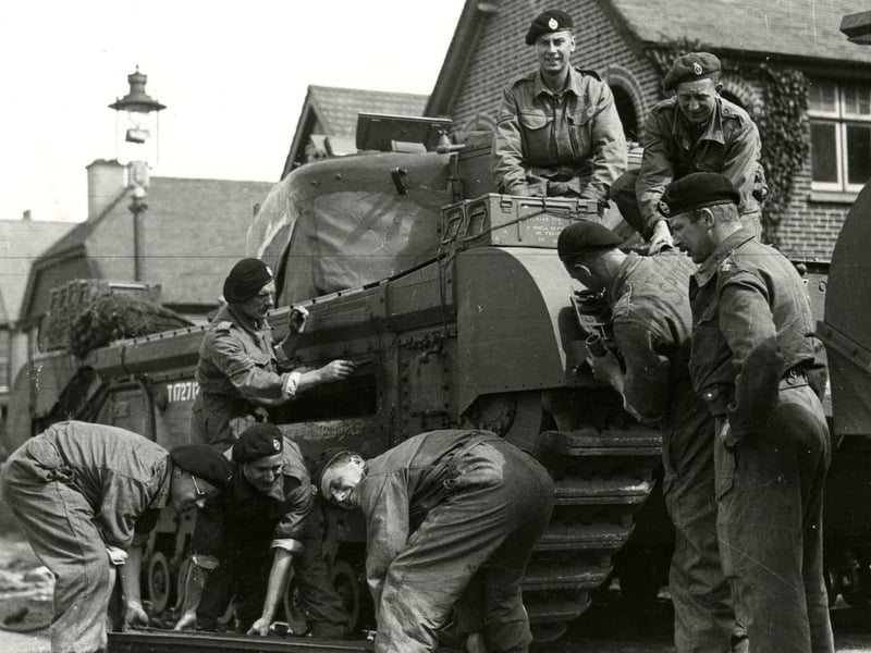 Churchill tank crews making their final preparations.