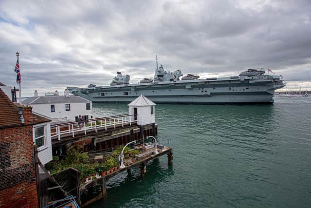 Pictured: HMS QE as it passes The Point, Old Portsmouth. View from Sill & West pub.
Picture: Habibur Rahman