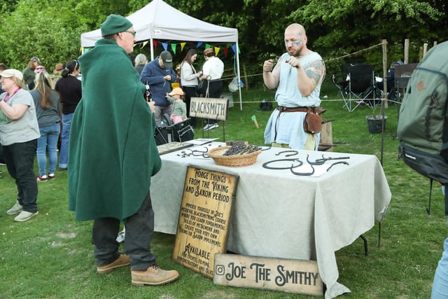 A blacksmith demonstrates ancient techniques at Beltain Festival.