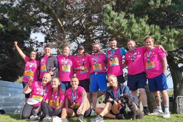 Last year's running group with their medals