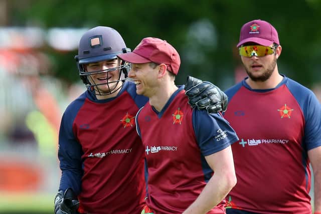 Chris Stone, centre, is congratulated on his catch by Havant wicket-keeper George Metzer. Picture: Chris Moorhouse