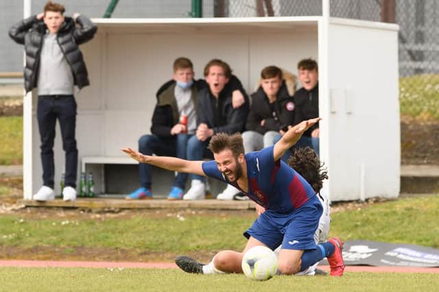 Dec Seiden is fouled during US Portsmouth's semi-final loss to Binfield. Picture: Keith Woodland