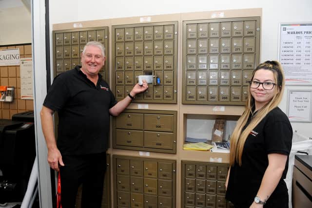 Mail Boxes Etc in Portsmouth. Russell Sykes, co-owner and Mollie Stanhope, assistant manager.

Picture: Sarah Standing (121020-5339)