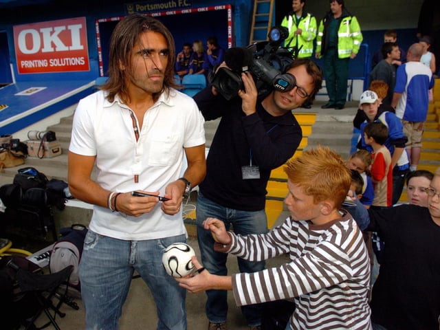 Pedro Mendes signs authograph for these young Pompey fans in the Blues dugout at Fratton Park in 2006