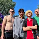 From left, Flowvers band members Connor Griffiths (20), Matisse Moretti (20), Stanley Powell (20) and Henry Wood (19) at the Isle of Wight Festival. Picture: Eleanor Davies