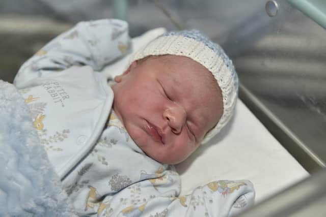 Matteo Oprea born on New Year's Day at Queen Alexandra Hospital to parents Rebecca Elliott and Cristi Oprea from Liphook, at 11.58am. He weighed 9lb 6oz. Picture: Sarah Standing (010124-4333)