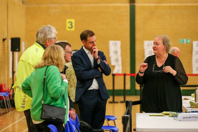 Executive head of place at Havant Borough Council, Alex Robinson, centre. Havant election count, Horizon Leisure Centre, Civic Centre Road, Havant Picture: Chris  Moorhouse (030524-12)