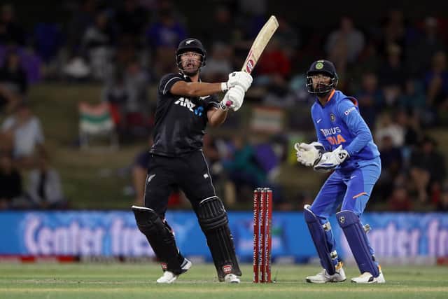 New Hampshire signing Colin de Grandhomme hits out in a T20 international for New Zealand. Photo by Hannah Peters/Getty Images.