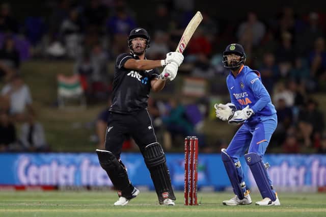 New Hampshire signing Colin de Grandhomme hits out in a T20 international for New Zealand. Photo by Hannah Peters/Getty Images.