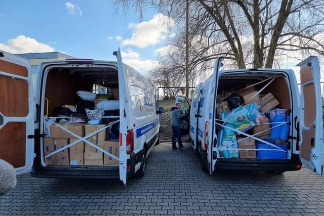 The two vans filled with donations. 
