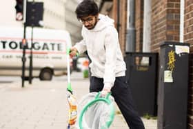 Vivak Gurav plogging - jogging and litter picking - on the streets of Bristol