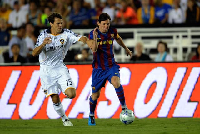 Stefani Miglioranzi had two spells at LA Galaxy. Here he faces Barcelona's Lionel Messi in an August 2009 friendly. Picture: Kevork Djansezian/Getty Images