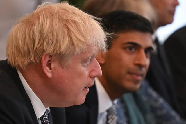 British Prime Minister Boris Johnson and Britain's Chancellor of the Exchequer Rishi Sunak attend the weekly Cabinet meeting at Downing Street on July 5, 2022 in London, England. (Photo by Justin Tallis - Pool/Getty Images)