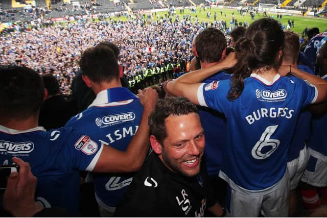 Leam Richardson joins in with the celebrations after Pompey clinched promotion back to League One at Notts County in April 2017 - three games before that final-day victory against Cheltenham which clinched the League Two title