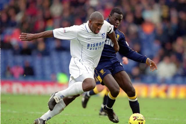 Darren Moore in action for Pompey against Wimbledon and a young Patrick Agyemang in December 2000.  Picture: Craig Prentis /Allsport