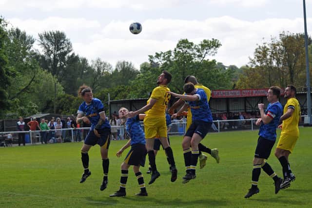Harvest (yellow) v Hook. Picture by Ian Grainger.
