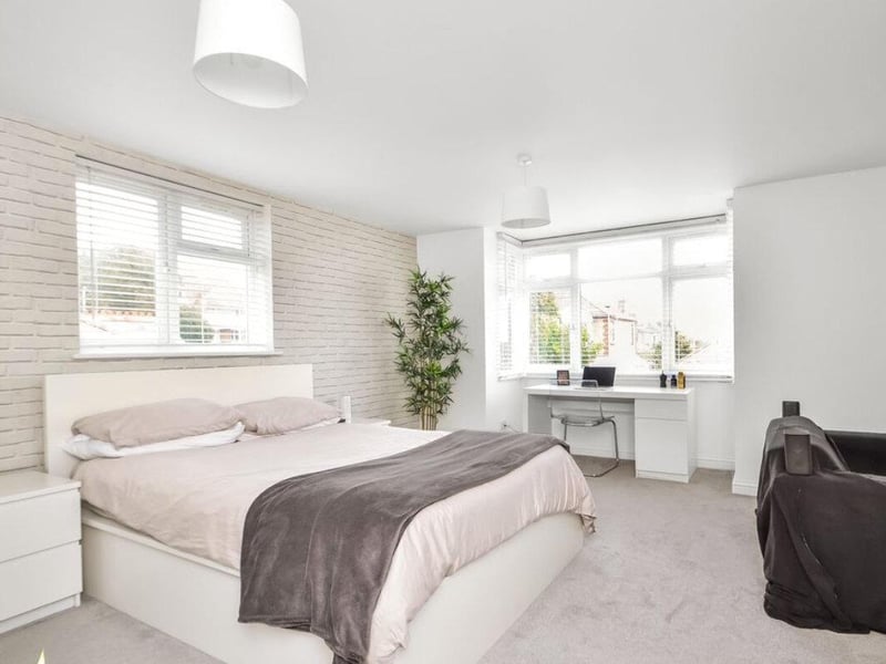 This property comes with five bedrooms, four reception rooms and three bathrooms.