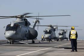 Merlin’s from 820 Naval Air Squadron landing on HMS Queen Elizabeth