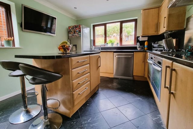 The listing says: "The property provides ample living space is arranged over two primary floors and comprises, hallway, 22’ living room, dining room, fitted kitchen, utility room, cloakroom and study on the ground floor."