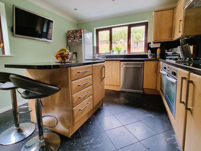 The listing says: "The property provides ample living space is arranged over two primary floors and comprises, hallway, 22’ living room, dining room, fitted kitchen, utility room, cloakroom and study on the ground floor."