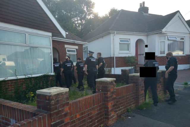 Police taking part in the raid in Chamberlain Grove. Picture: Fareham Police