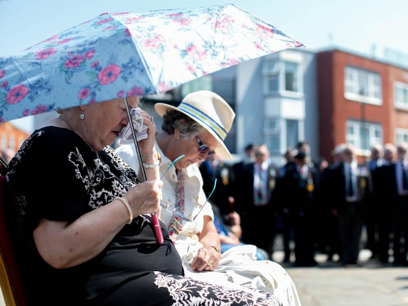 Pictured: A visitor sheds a tear during the minute's silence
Picture: Habibur Rahman
