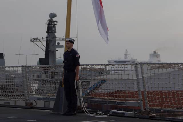 HMS Duncan's crew pictured returning to the ship- following the vessel's 18-month refit,