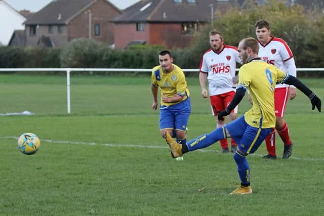 Meon Milton's Barry Jeans converts a penalty against Rowner. Picture: Kevin Shipp