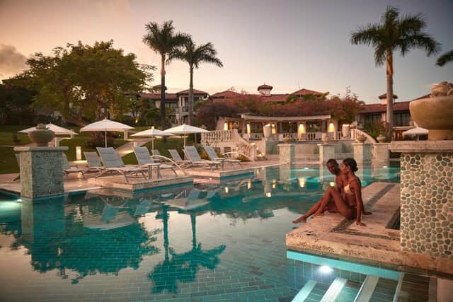 The Sandals main pool at twilight