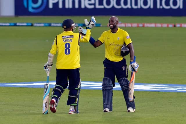 Michael Carberry celebrates reaching his T20 century against Lancashire in 2013. Picture: Neil Marshall