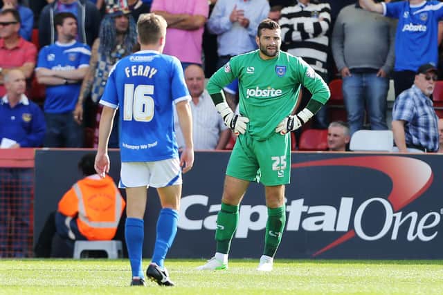 John Sullivan is frustrated after conceding against Cheltenham in a 2-2 draw in September 2013. Picture: Joe Pepler