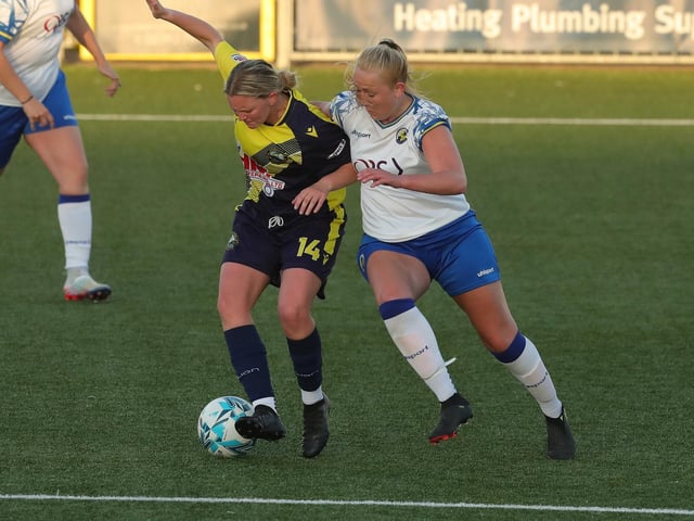 Hawks' Jodie Burchell, right, with Boro's Lauren Hickmott. Picture by Dave Haines