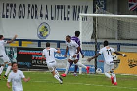 Empty terraces - Hawks celebrate scoring against Dartford in the National League South play-offs in July - in order for that game to take place the National League was classified as 'elite' football, the same ruling which is now preventing clubs at that level from welcoming fans. Pic: Dave Haines.