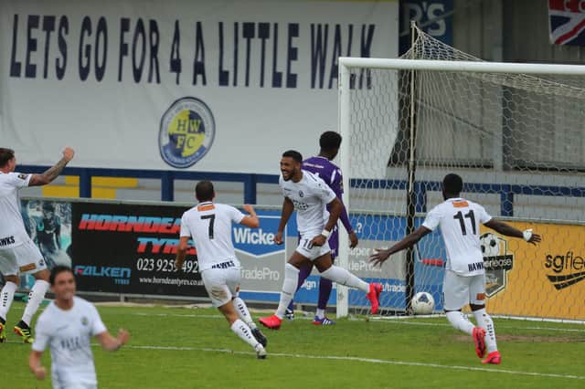 Empty terraces - Hawks celebrate scoring against Dartford in the National League South play-offs in July - in order for that game to take place the National League was classified as 'elite' football, the same ruling which is now preventing clubs at that level from welcoming fans. Pic: Dave Haines.