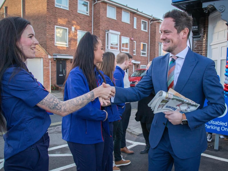 A new Tesco Express has opened in St George's Road, Old Portsmouth on Wednesday 15th November 2023Pictured: MP Stephen Morgan greeting staff outside the Tesco Express store with Nelson the Pompey mascot marking the opening of the storePicture: Habibur Rahman
