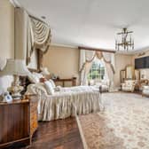 The property listing says: "The sizeable principal bedroom suite has beautiful south easterly facing views across the landscaped grounds."