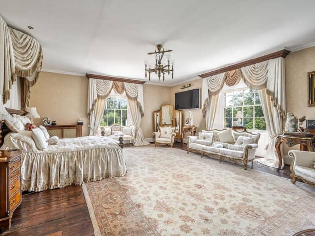 The property listing says: "The sizeable principal bedroom suite has beautiful south easterly facing views across the landscaped grounds."