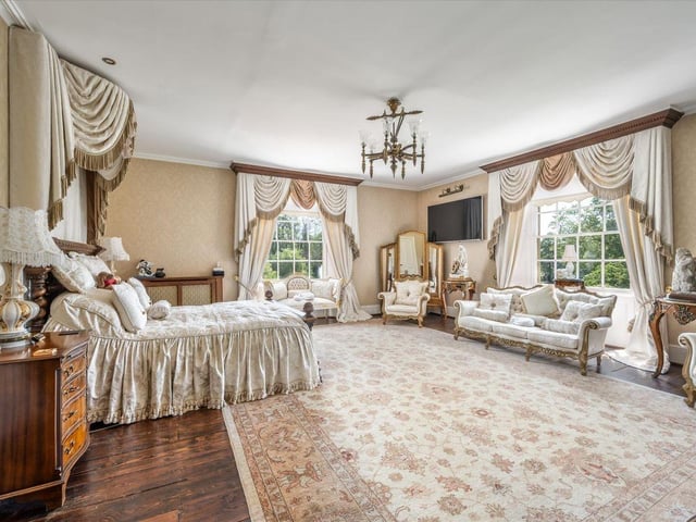 The property listing says: "The sizeable principal bedroom suite has beautiful south easterly facing views across the landscaped grounds."
