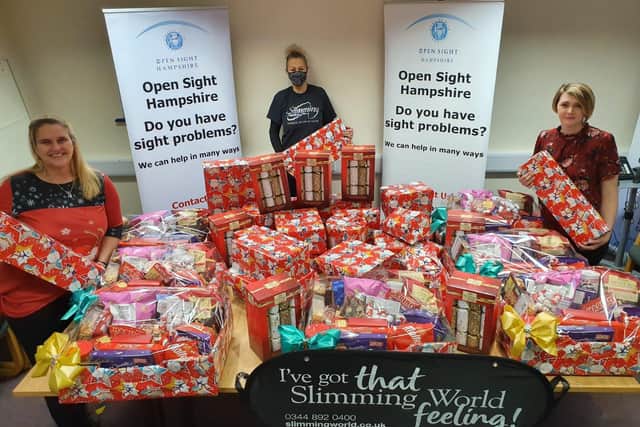 Kay Godwin of Slimming World (centre) with Debbie Ross (left) and Nicky Wilmot (right) of Open Sight Hampshire. Picture: Open Sight Hampshire.