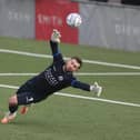 Ross Worner saved a first half penalty as Hawks stretched their unbeaten National League South run to six games with a 1-1 draw at lofty Dartford. Picture: Dave Haines.