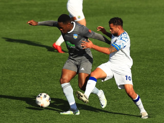 Billy Clifford battles for possession against Concord. Picture  by Dave Haines