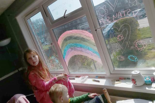 Victoria Vassallo from Leigh Park, has been painting rainbows with her children Amelia 7 and Aiden 2 to send a positive message to the community