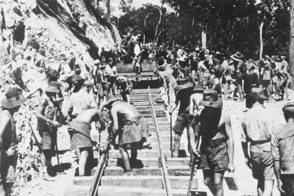 British and Australian prisoners of war laying railway track in Burma. Photo: Australian War Memorial
