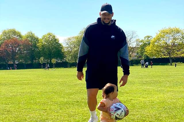 Former Hawks and Gosport goalkeeper Nathan Ashmore plays with daughter Naevia