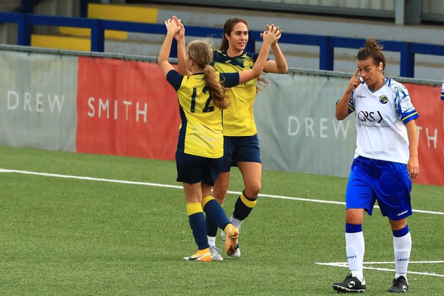 Moneys' Ella Wright celebrates her goal with Kau'inohea Taylor. Picture by Dave Haines