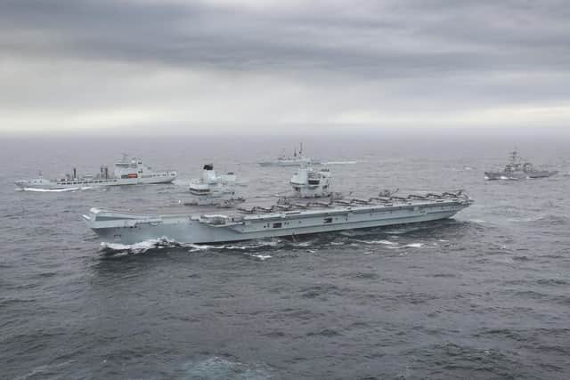 HMS Queen Elizabeth pictured with some of her carrier strike group in 2020. Photo: Royal Navy