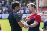 Cheltenham boss Wade Elliott praised experience Pompey in defeat on Saturday.