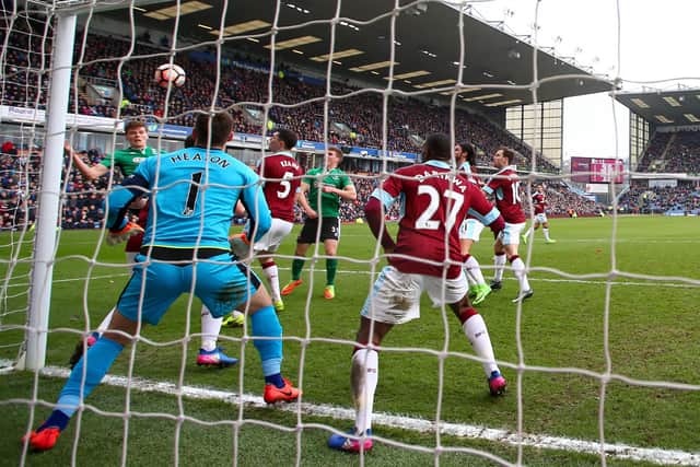 Sean Raggett heads home Lincoln's winner against Burnley in 2017.   Picture: Clive Brunskill/Getty Images