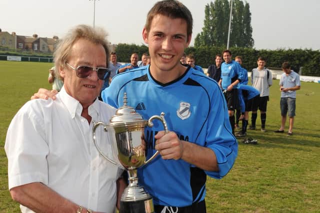 Flashback - Barry Campbell presents the Portsmouth Dockyard League's John Sugden Cup to Co-Op Dragons' Robert Crook after his side's victory over Star Electrical at Moneyfields FC in 2011. Picture: Malcolm Wells