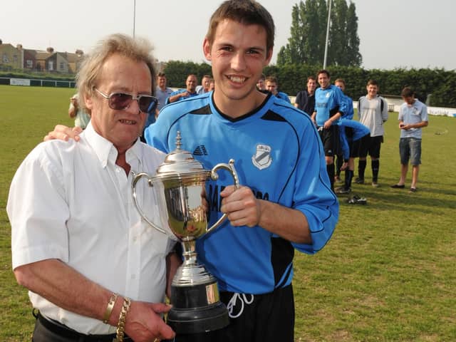 Flashback - Barry Campbell presents the Portsmouth Dockyard League's John Sugden Cup to Co-Op Dragons' Robert Crook after his side's victory over Star Electrical at Moneyfields FC in 2011. Picture: Malcolm Wells